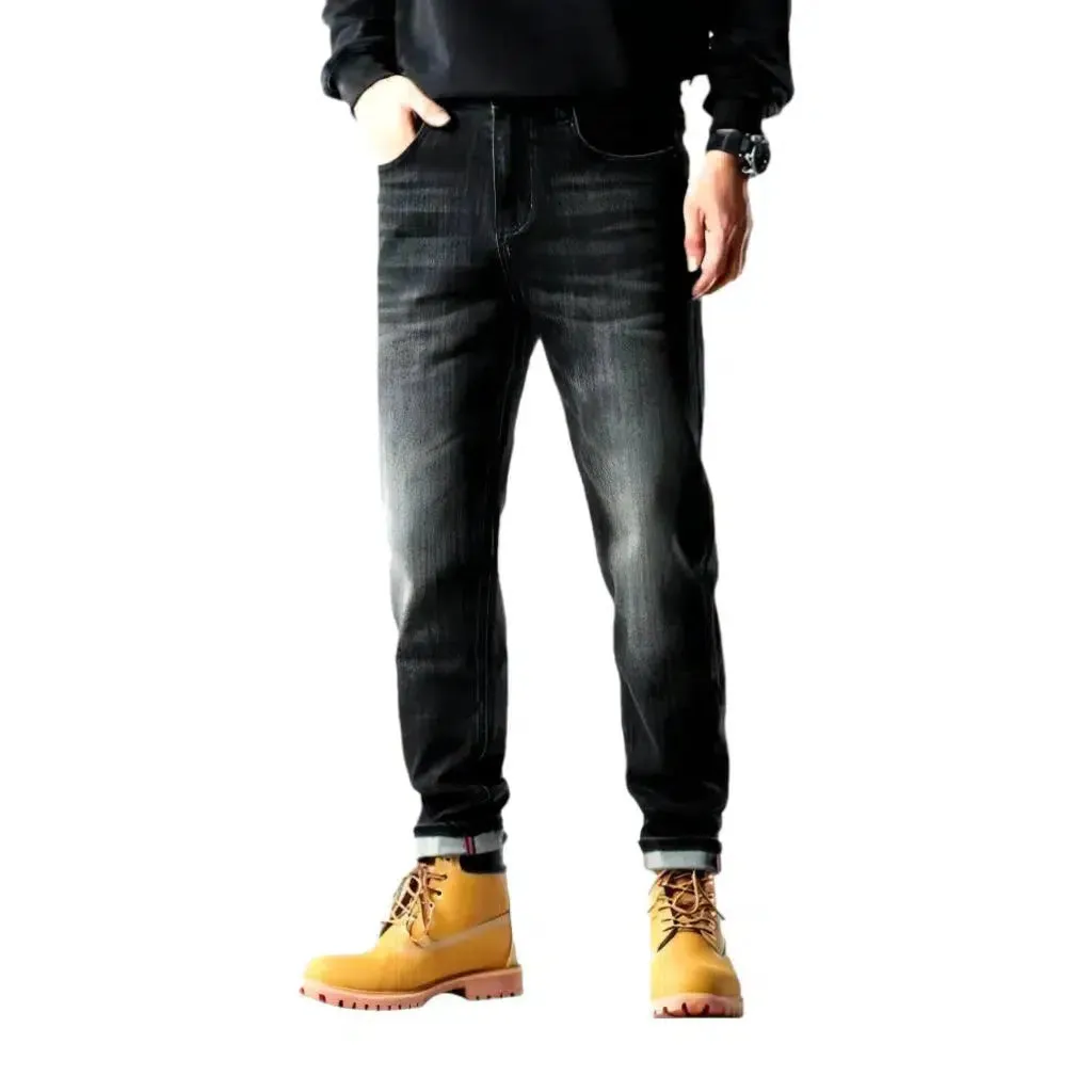 Whiskered men's tapered jeans